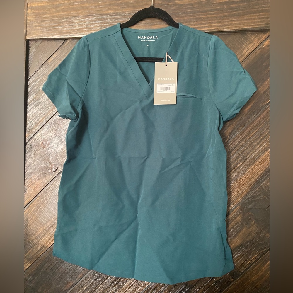 NWT!!! Mandala “Pocket Top” in Caribbean blue. Size M. Never worn!!!